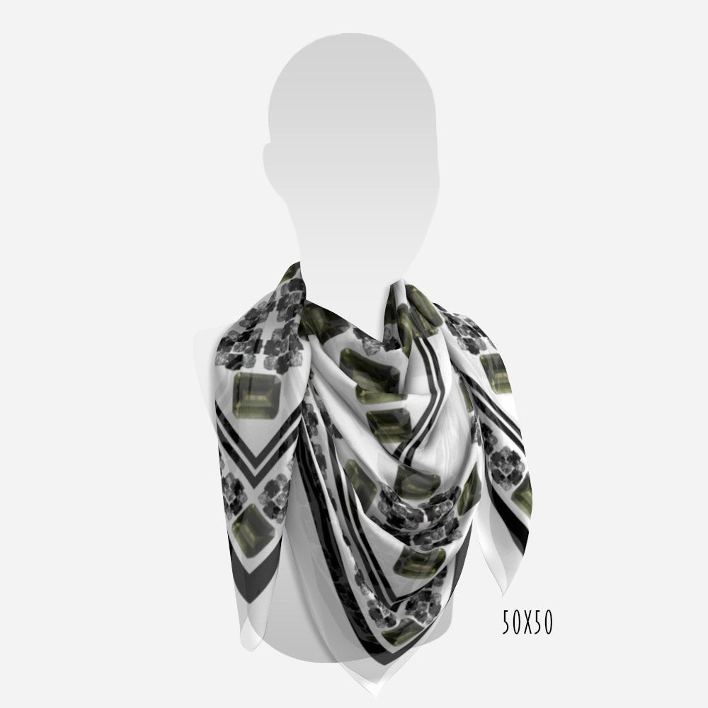 view of 50"x50" black white and moldavite scarf on neck of mannequin